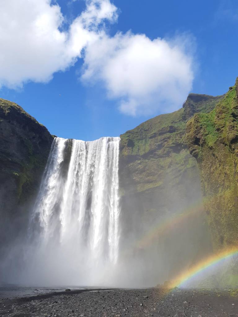 Skógafoss waterfall double rainbow